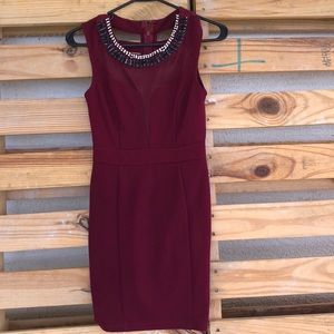 Burgundy/Marsala colored cocktail dress.